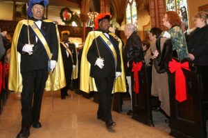 MEMBERS OF KNIGHTS OF PETER CLAVER PROCESS PRIOR TO MASS AT CHICAGO CHURCH IN 2007